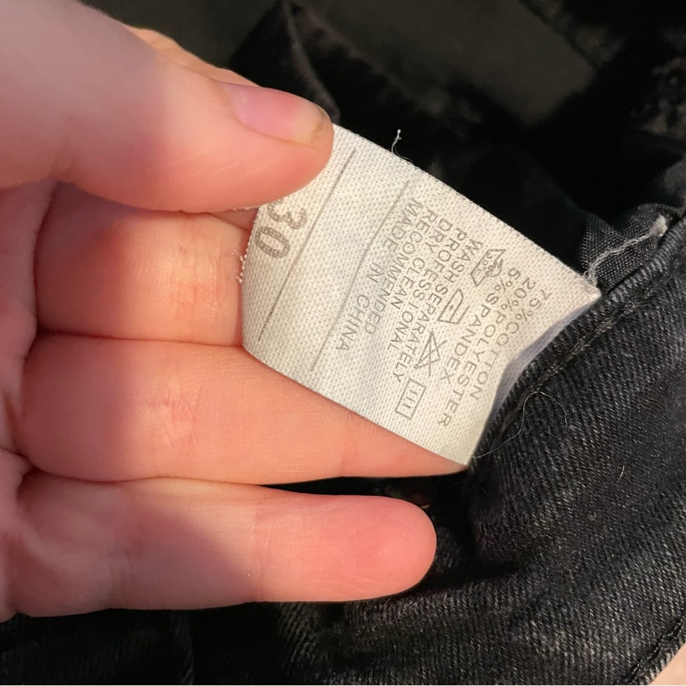 Black distressed jeans with rips on the knees and a button fly - Picture 6 of 6